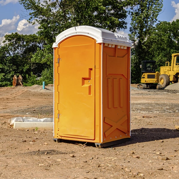 what is the cost difference between standard and deluxe portable restroom rentals in Veblen